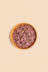 Cibo umido per cani in scatola con carne di anatra